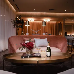 a table with a bottle of wine on it