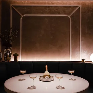 a table with wine glasses on it