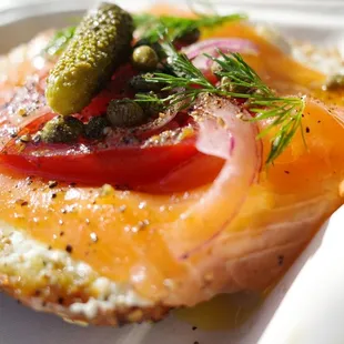 Hand cut smoked salmon over everything bagel