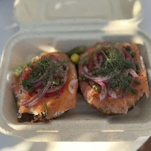 Sliced smoked salmon on burnt everything