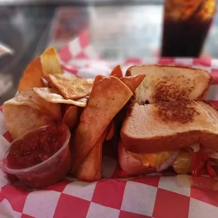 a sandwich and chips on a table