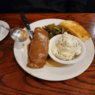 Giant meatloaf, potato salad, green beans and texas toast
