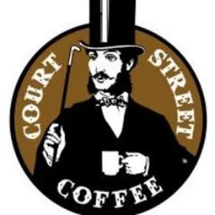 a man in a top hat holding a cane