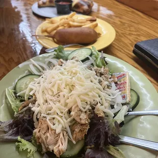 Grilled chicken salad, Kids corn dog meal &amp; calzone.