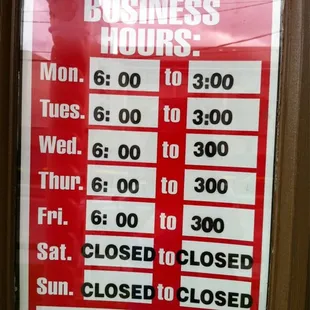 a business hours sign
