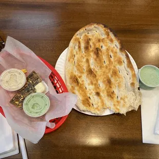 Naan and complimentary hot tea while I wait for meal.