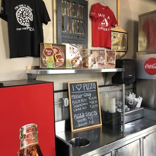 a counter with a coca cola bottle