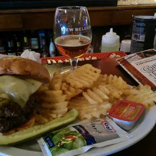A double jalapeño pepperjack burger with waffle fries... that burger was tastee and the fat tire was a perfect match.