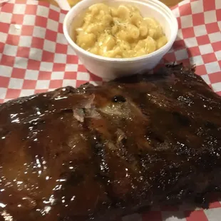 1/2 rack of ribs. Little smoke flavor heavy sauce. Good bbq doesn't need sauce. Could not taste a dry rub