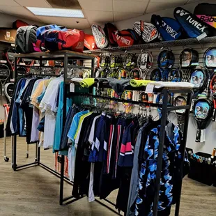 Tennis racquets and men&apos;s clothing