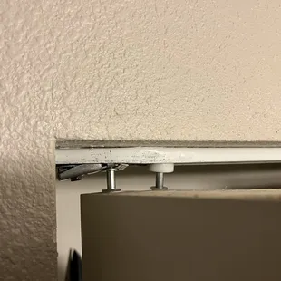 Closet door is not attached to the track and fell.