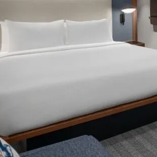 Notice how close the bed is to couch. Less than 10 inch clearance good luck maneuvering by that in the dark with your shins intact.