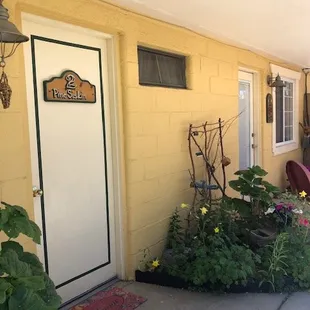 Lovely flower beds outside each door - unique