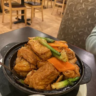 a bowl of chicken and vegetables