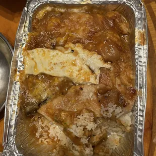 Baked pork chop with egg and rice