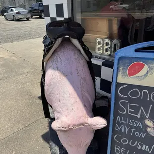 Can&apos;t miss the saddled up pig out front!
