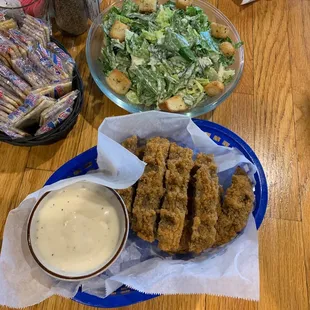 Steak fingers with Caesar salad
