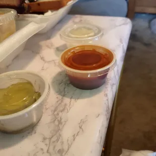 My one tablespoon of BBQ sauce for a 2 meat plate