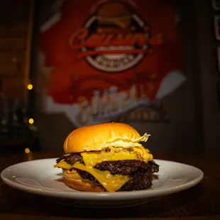 a cheeseburger on a plate