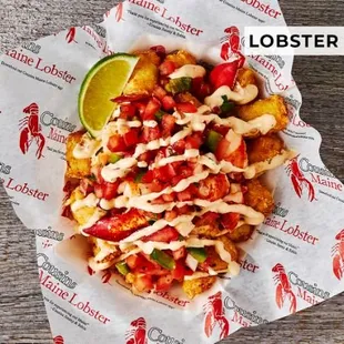 lobster tots with a lime wedge