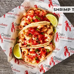 shrimp tacos with a lime wedge