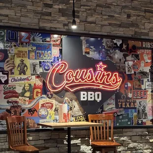 a restaurant with a brick wall