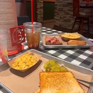 Pulled BBQ sandwich; street corn; kids sausage/Mac n cheese