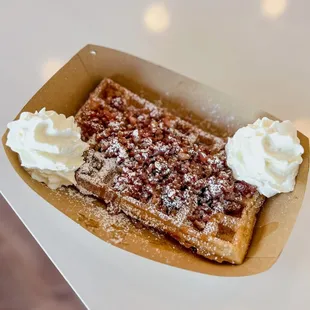 a waffle and whipped cream