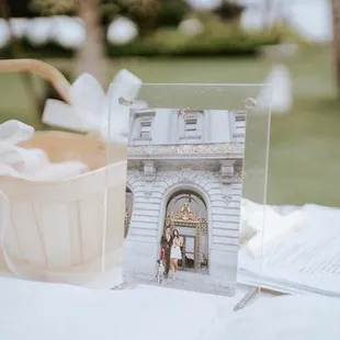 a basket was placed on the sign in table for guests to place their monetary gifts in