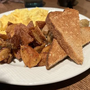 a plate of breakfast food on a table