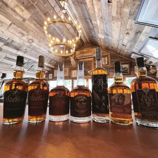 a row of whiskey bottles