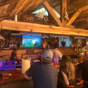 people sitting at a bar