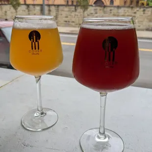 two glasses of beer on a table