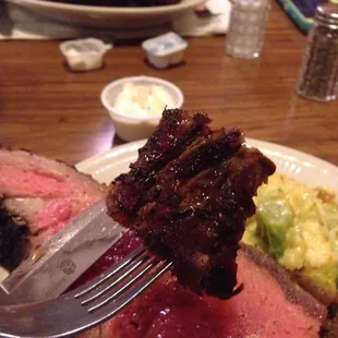 A piece of prime rib showing the charred, well, not charred, crisp maybe, outer crust. PITTSBURGH Rare!