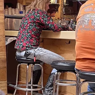 Locals rock the cool style. Peep the lighter accessory