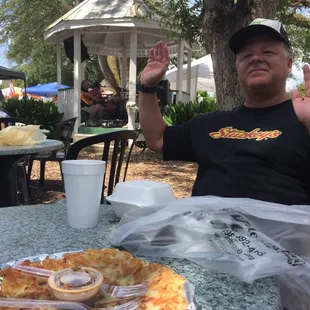 Enjoying the breeze and my Korean pancake ... To bluegrass!