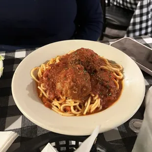 Spaghetti and huge meatballs.