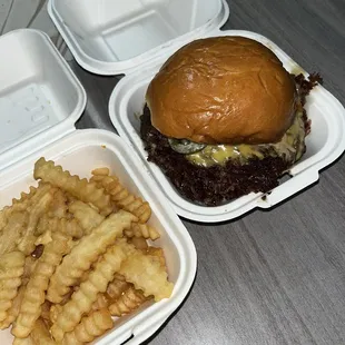delicious triple smash burger and fries