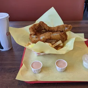 Fish and chips, tartar sauce, fry sauce &amp; almond roca milkshake