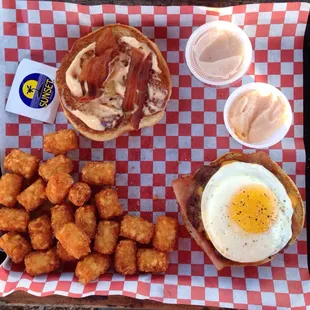 Rise and Shine burger and tots with a side of Sexy Sauce and Spicy mayo.