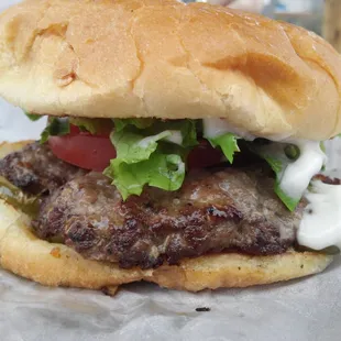Blue flame burger. Meat was done just right. Delicious jalapenos and blue cheese