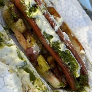 The El Pastor was out of this world!!! Pineapple... pesto...red onions and a squirt of mayo!  Definitely recommend!!!!