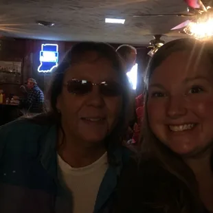 a woman and a woman in a restaurant