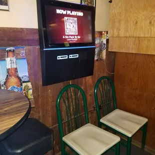 Touch tunes, but no phone app songs. $1 a song