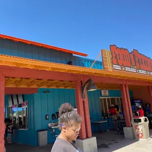 Food bar to left, bathrooms and lockers to the right