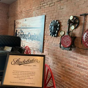 a brick wall with a sign on it