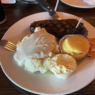 Strip cooked medium, mashed potatoes with cowboy cornbread. Steak wasn't full of flavor- coulda used steak sauce. Cornbread was good!