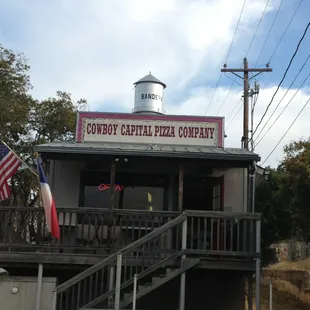 Great Pizza.  Picnic tables out front.   Pizza was priced right- and the toppings were fresh and generous too. Very good find.