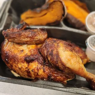 Half Wood-fired chicken and double sweet potato for the side