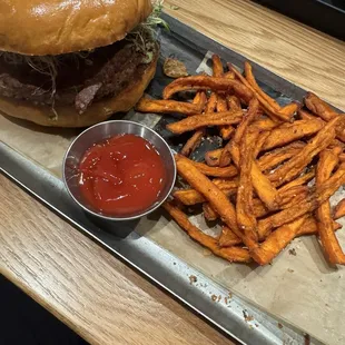 Veggie burger with sweet potato fries